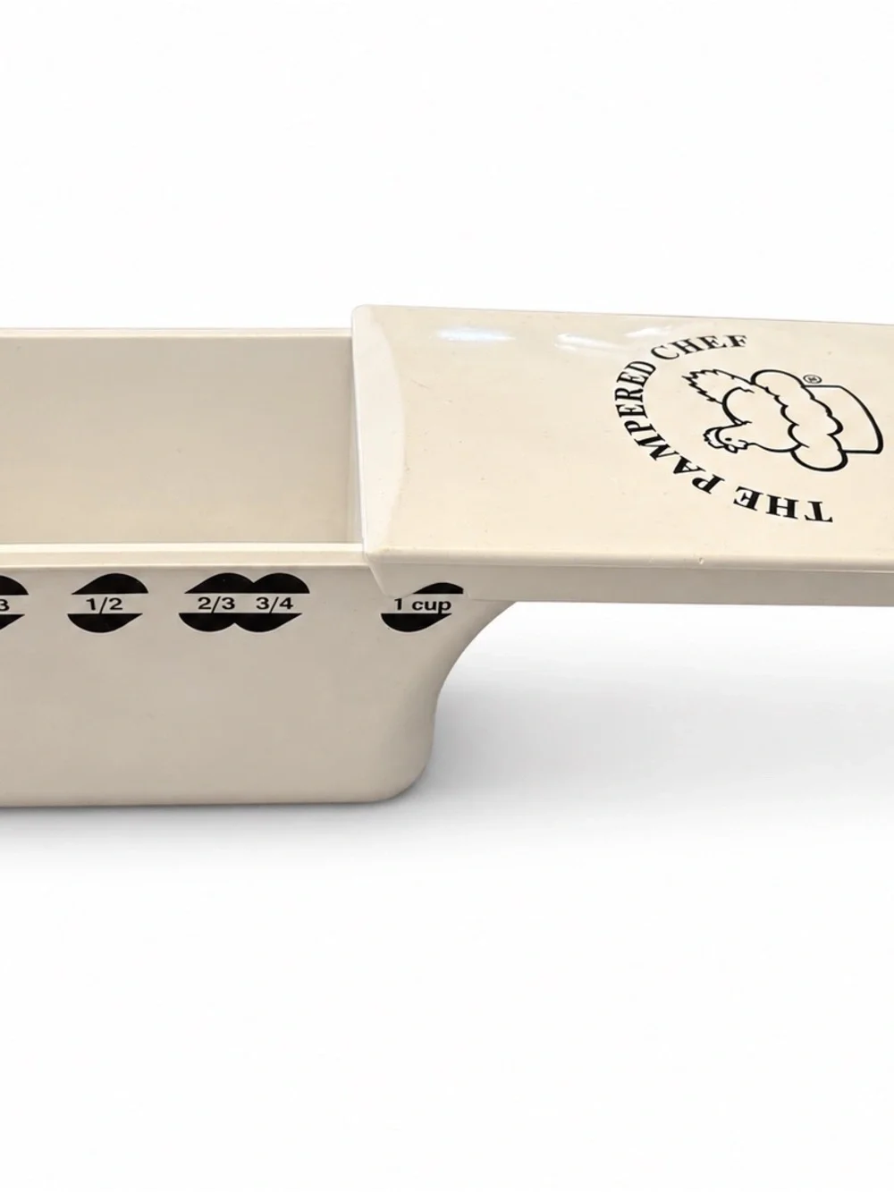The Pampered Chef White Adjustable Measuring cup Dry Measure 1/4 to 1 cup